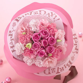 バラの花びらをイメージしたラッピングが素敵な花束　　誕生日の花束・ブーケ・フラワーギフト
